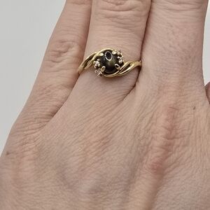 Vintage 14K Gold Black Star Sapphire Bypass Ring – Crescent Hallmark – Size 6.75